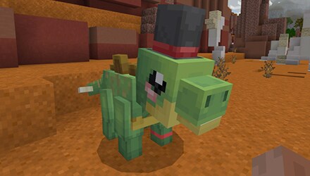 An adorable baby dino in a top hat.