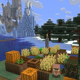A village field in front of an iceberg