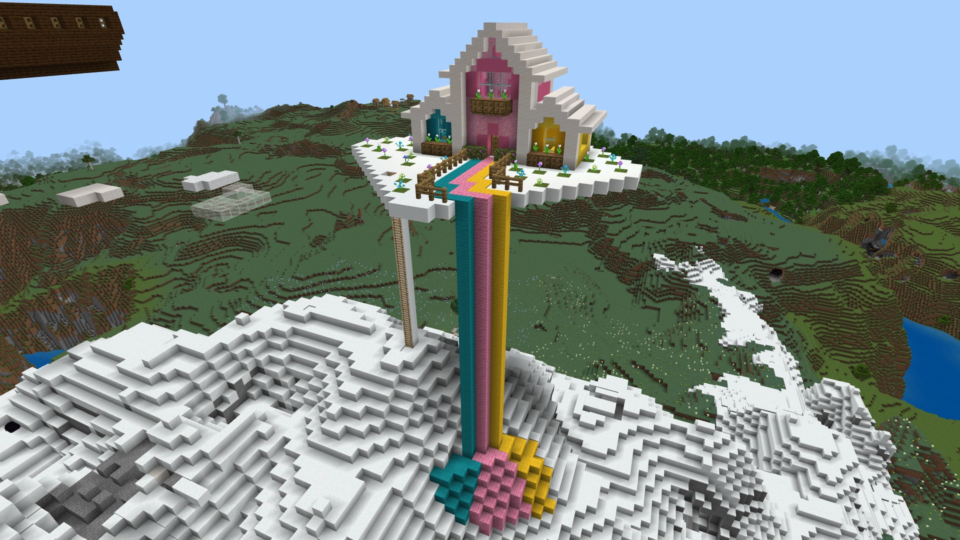 Multicolored cottage in the sky with rainbow colors pouring out and down off the ledge like a waterfall