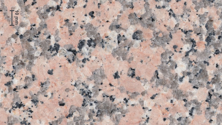A close-up photo of a polished granite stone.