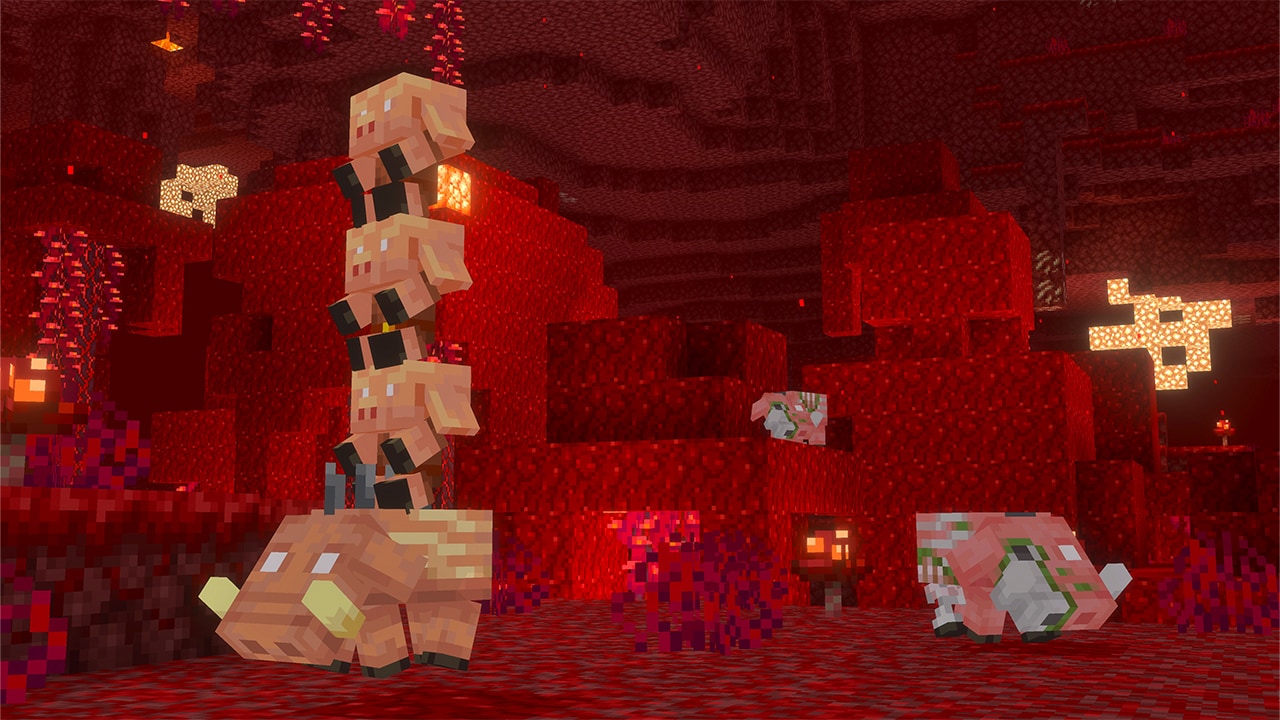 In the crimson forest in the Nether, several small piglins stack on top of a baby hoglin.