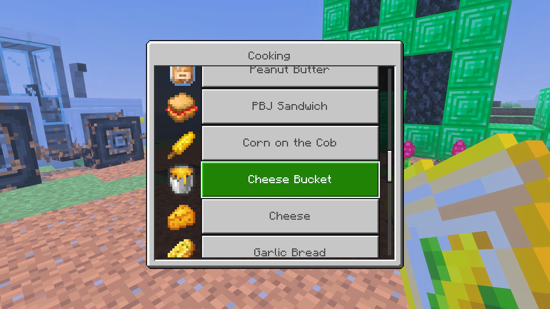 Minecraft cooking menu displaying food recipes, with Cheese Bucket selected.