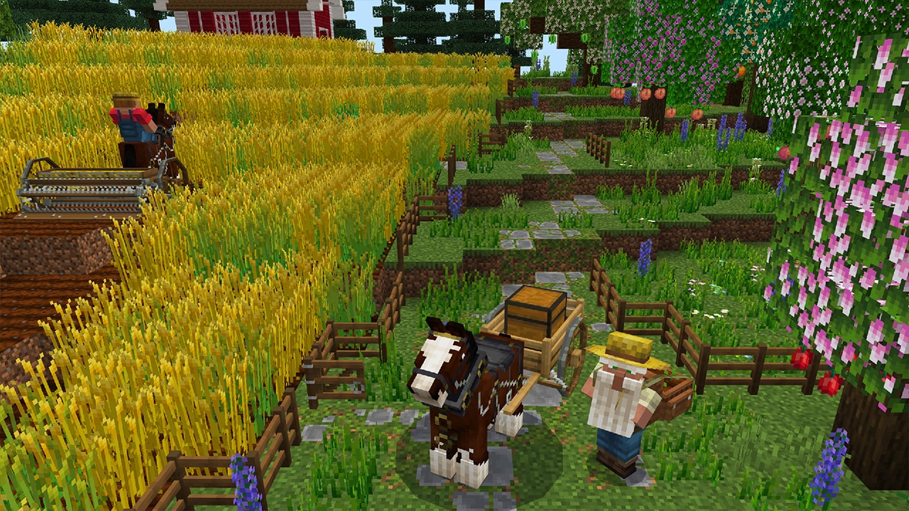 Farmer next to a field and a cow