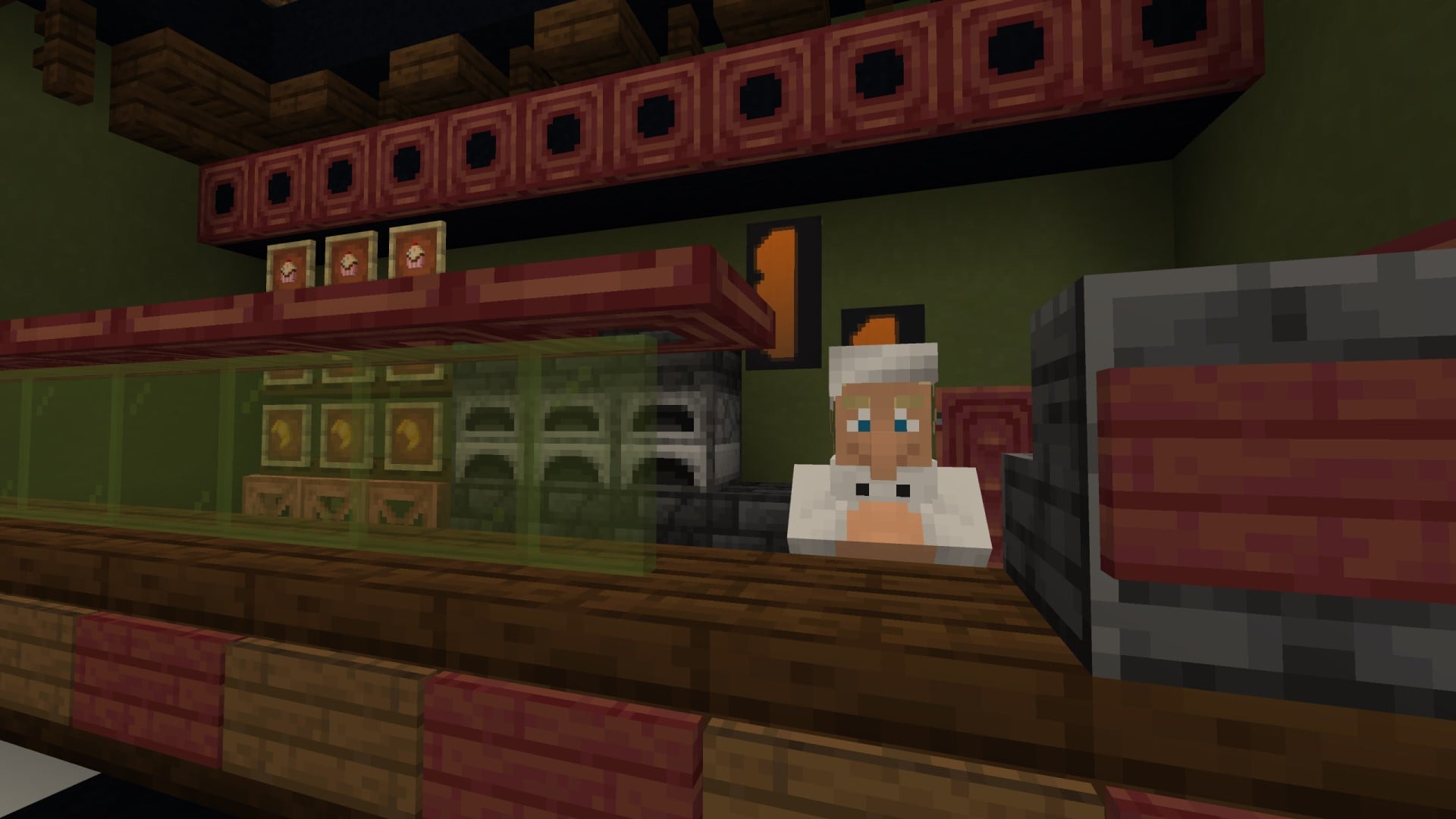 Bakery interior from the Cute Shops add-on, featuring a villager shopkeeper, display counter, ovens, and decorative shelving.