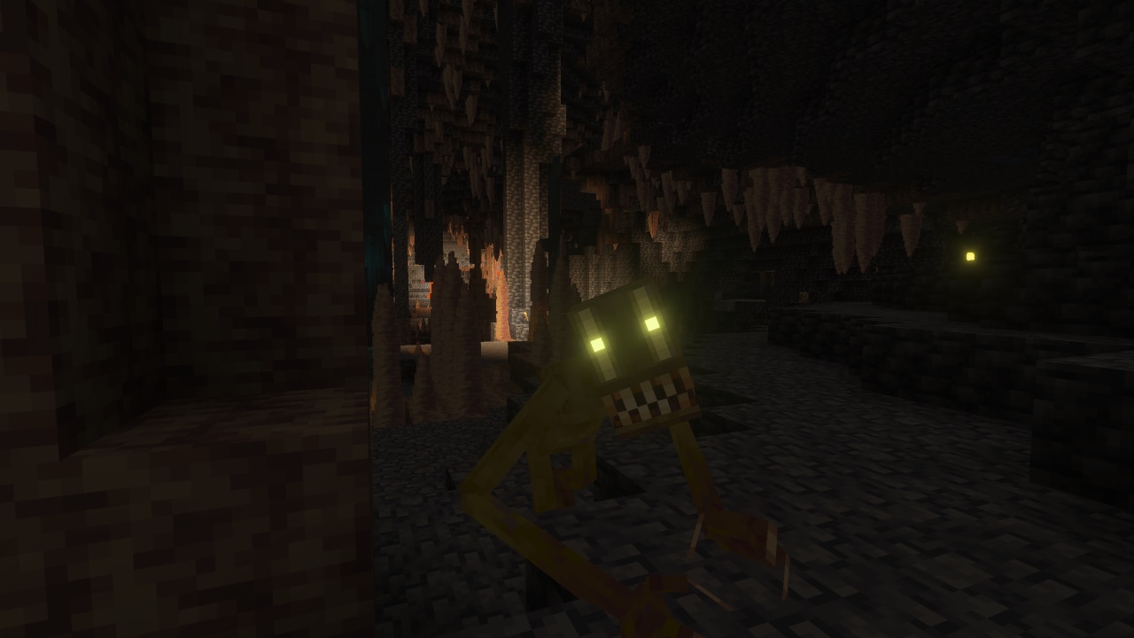 A long-limbed creature with glowing yellow eyes and exposed teeth crawls through a dark Minecraft cavern.
