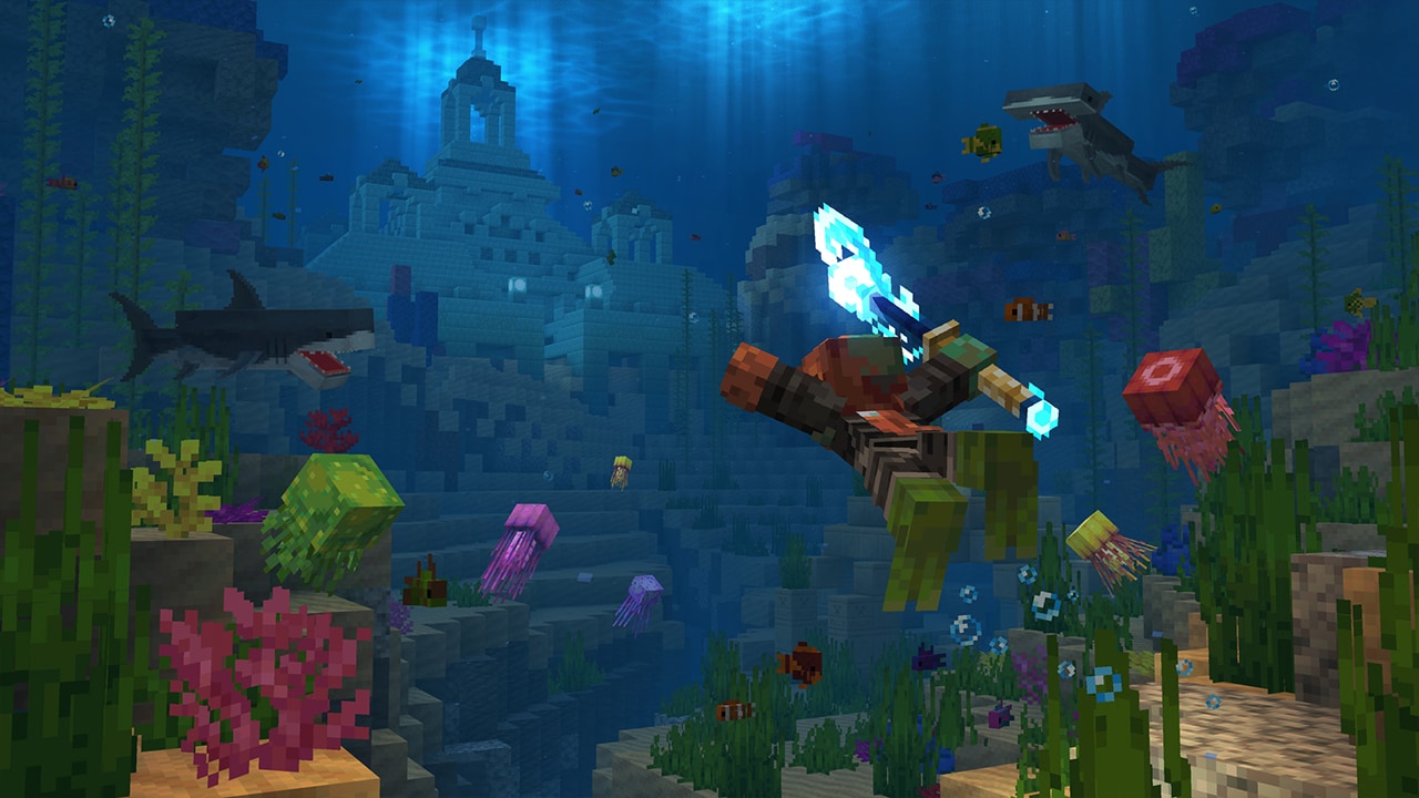 Under the sea with lots of fish and shark swimming about