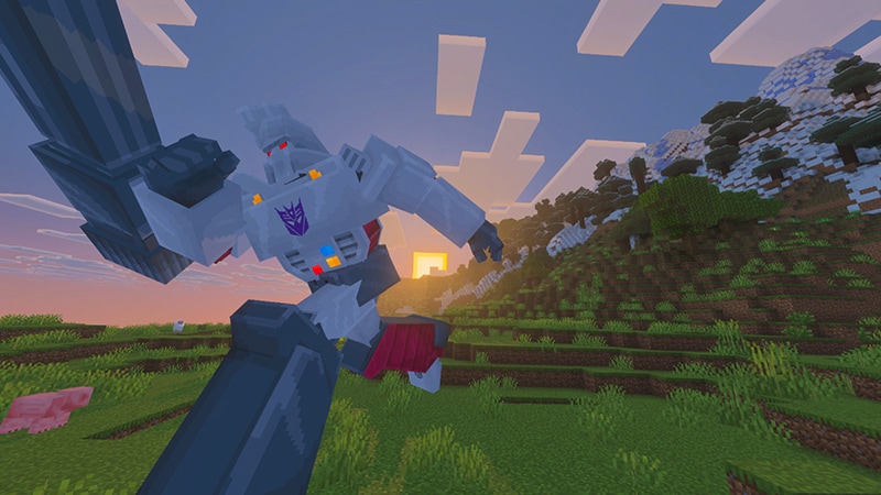 Megatron running through a Minecraft world while the sun is setting in the background.