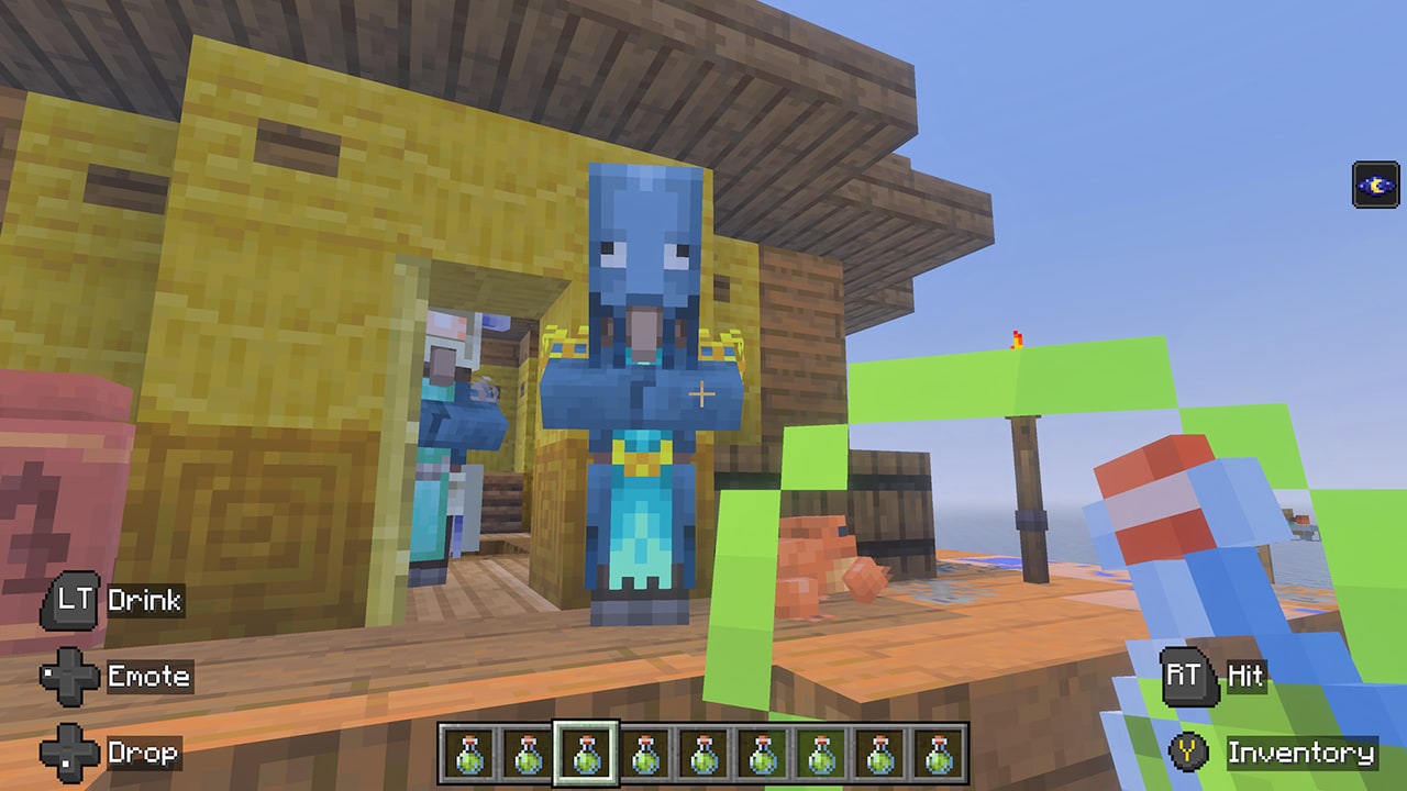 A villager stands outside a waterside hut while the player holds a bottle and green potion effects swirl on screen.