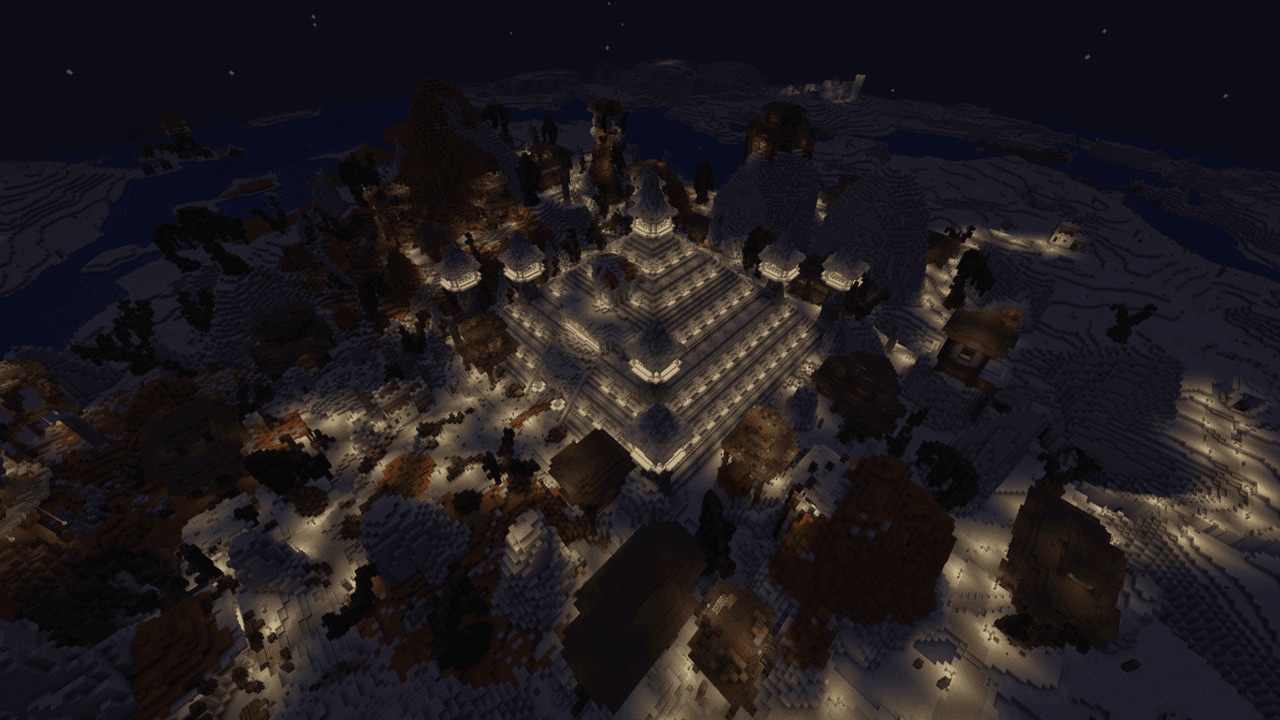 An illuminated desert city with grand pyramid at night