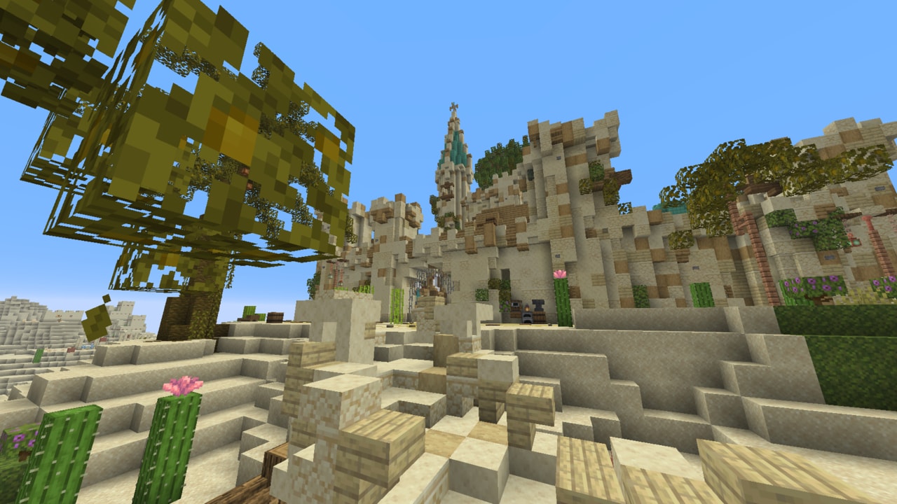 A desert fortress carved into sandstone cliffs and dunes