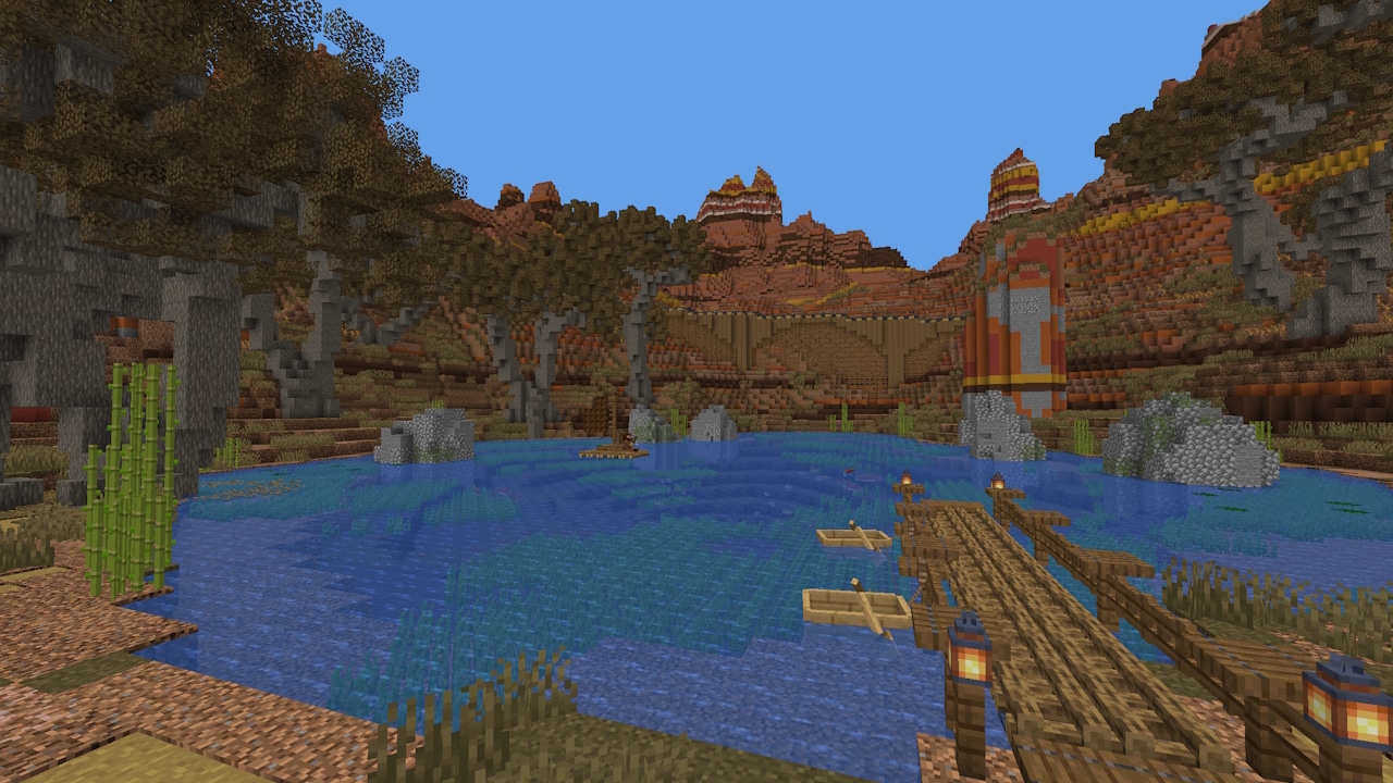 A peaceful oasis with clear blue water, docks, and small boats rests among rugged canyon cliffs and desert vegetation.