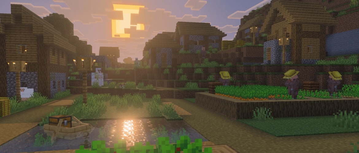 A Minecraft village at sunrise. There is a boat with a chest on some water in the foreground.