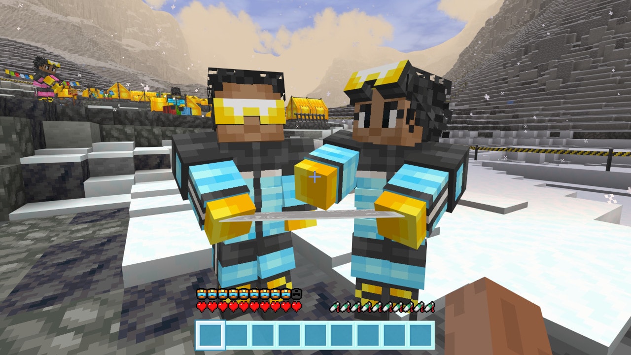 Two climbers in winter suits at base camp on icy ground