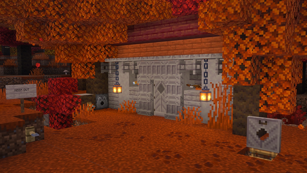 Crossbows point out from the windows of a base built in the forest from grey, orange, and crimson blocks. A sign reads: KEEP OUT.