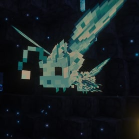 A pale-blue winged Minecraft creature flying through a dark cavern filled with glowing blue particles.