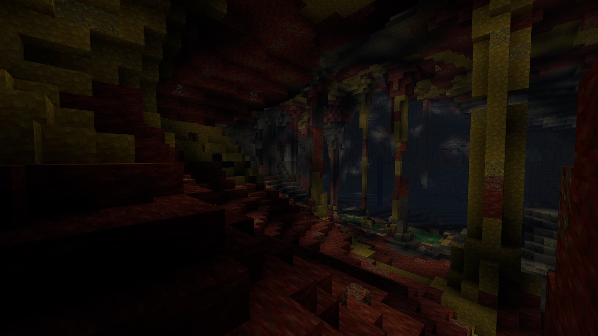 A faintly lit sulfur cave contains columns of yellow sulfur blocks and red cinnabar blocks.