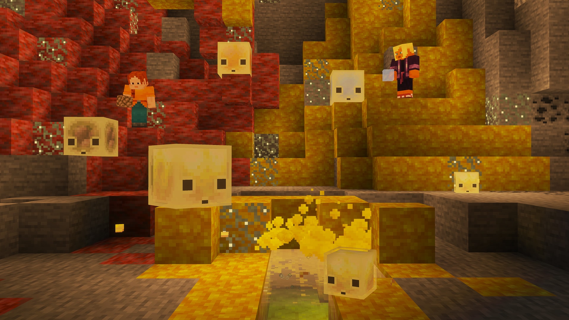 Two players explore a sulfur cave with red cinnabar blocks on the left, yellow sulfur blocks on the right, and sulfur cube mobs scattered throughout.